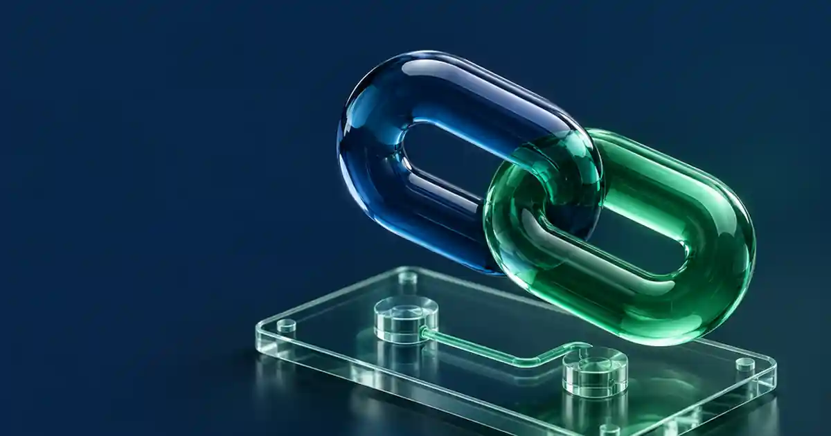 Dos eslabones de cristal unidos sobre una base transparente, símbolo de una relación comercial declarada